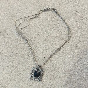 Elegant Silver Necklace with Black Pendant
